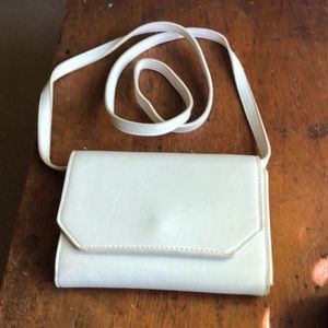White Kimche Blue shoulder purse or clutch.
